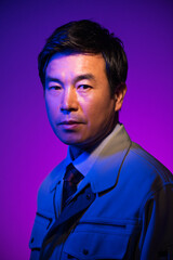 作業服を着た50代ビジネスマン