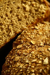 Macro, close up detailed image of multigrain crusted  brown bread loaf.
