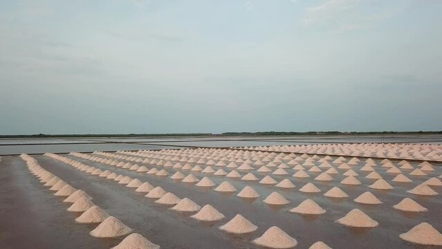 A salt evaporation pond is a shallow artificial salt pan designed to extract salts from sea water 