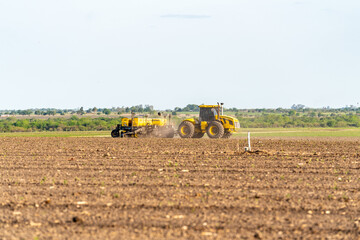 Fototapeta na wymiar tractor plowing the land for sowing