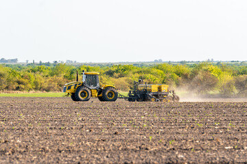 tractor plowing the land for sowing