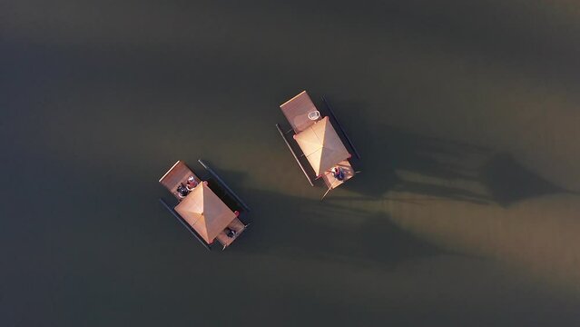 Aerial view of Sunrise with fog over Ban Rak thai, chinese village near a lake in Mae Hong Son, Thailand