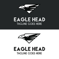 Simple drawing of eagle head with piercing eye in silhouette style for financial company logo design