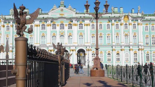 The State Hermitage Museum, Palace Square, people on a sunny day.
