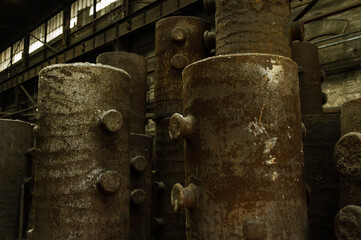 Large metal molds at abandoned industrial foundry