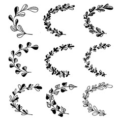 Set of hand drawn doodle tree branches with leaves on white background