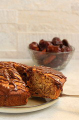 Date and nut cake with chocolate glaze