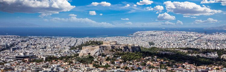 Fototapeta na wymiar Athens, Greece. Acropolis and Parthenon temple. Ancient ruins and cityscape, panorama aerial view
