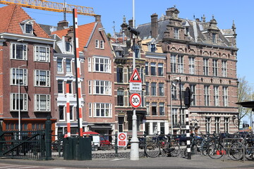 Amsterdam Schippersgracht Street View with Traditional Buildings and Parked Bicycles, Netherlands