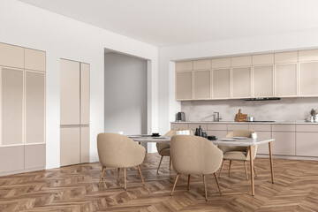 Light kitchen interior with dining table and seats, shelves and kitchenware