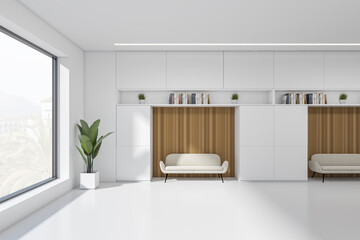 Light lounge room interior with sofa in office hall, panoramic window