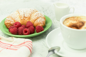 Croissants and fresh raspberries, Fresh and delicious croissants.