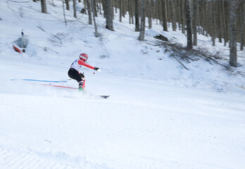Fototapeta na wymiar young athlete in a special slalom competition, Italy