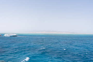 Naklejka na ściany i meble With sunshine and warm waters all year round, Sharm El Sheikh is the closest destination to Europe where you can soak up sun, dive amazing corals reefs, and enjoy the sea any time you need a break.