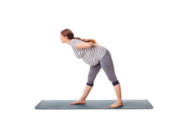 Pregnancy yoga exercise - pregnant woman doing yoga asana parsvottanasana Intense Side Stretch pose...