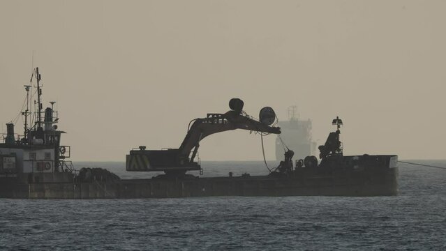 Container ships on the horizon in barcelona
