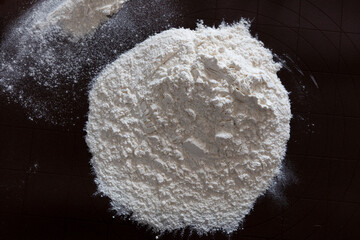 white flour on black background