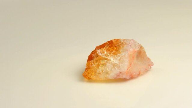 Citrin gemstone on a turn table