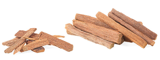 Pile of sandalwood sticks isolated on a white background. Chandan or sandalwood.