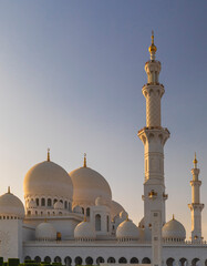Fototapeta na wymiar ABU DHABI, UAE - April 18, 2022: Sheikh Zayed Grand Mosque at dusk