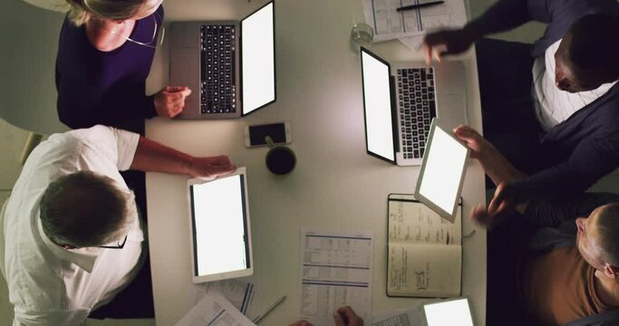 Finalising their plans for success together. 4k video footage of a group of businesspeople having a meeting in an office.