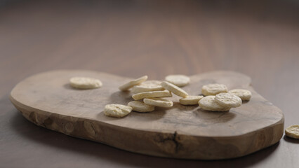 freeze dried banana chips on olive board