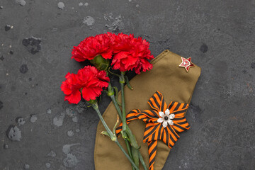 Victory Day, 9 May holiday concept. George Ribbon, Soviet orders of Second war, carnation flowers,...