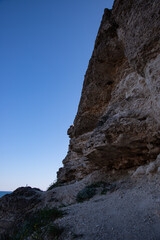 Summer hiking in the mountains. Top view of the green meadows.
