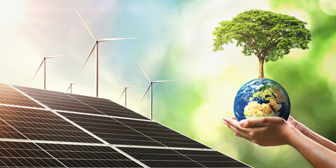 hand holding tree growing on globe with solar cell and turbine. concept clean energy for save...