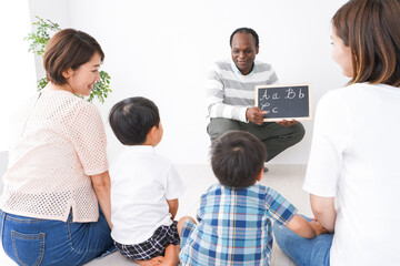 Children and mother attending English School