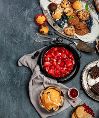 Dessert table with all kinds of cakes and snacks.