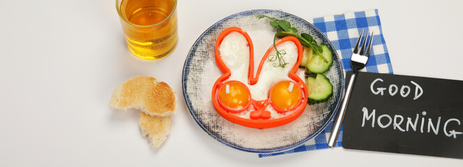 Sunny-side-up eggs for kids on colourfull background.