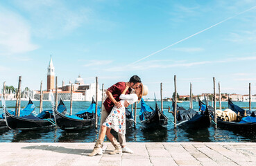 Couple of lovers visiting Venice, Italy - Boyfriend and girlfriend having romantic italian weekend