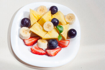 fruit salad on a white plate