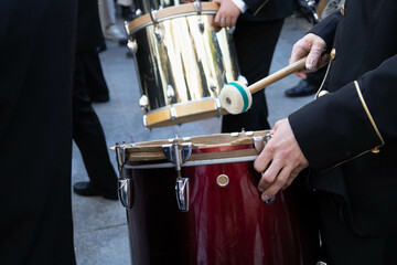 Drum musician playing in the street in the Holly week in Cordoba, Spain.