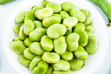 A plate of shelled fresh organic vegetable broad beans