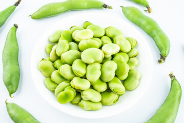 A plate of shelled fresh organic vegetable broad beans