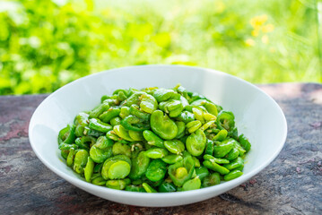 Fried broad beans with local vegetables and green peppers in Hunan, China