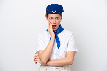 Airplane stewardess woman isolated on white background surprised and shocked while looking right