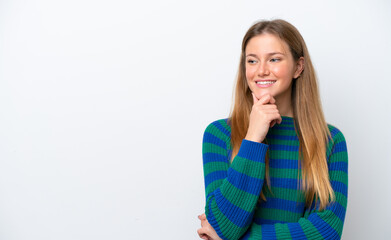 Young caucasian woman isolated on white background looking to the side and smiling