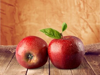 Group of tasty sweet fresh Apple on wooden board background, Fruits concept.