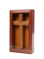 Wooden crucifix standing in box on white background