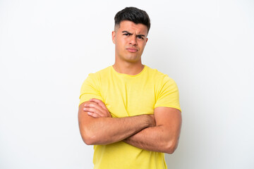 Young caucasian handsome man isolated on white background feeling upset