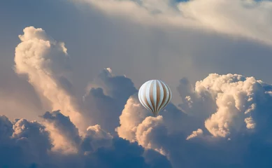  Classic type hot air balloon flying over the clouds © muratart