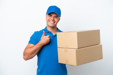 Delivery caucasian man isolated on white background giving a thumbs up gesture