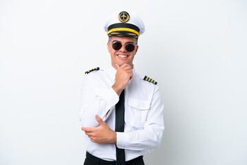Airplane pilot caucasian man isolated on white background with glasses and smiling
