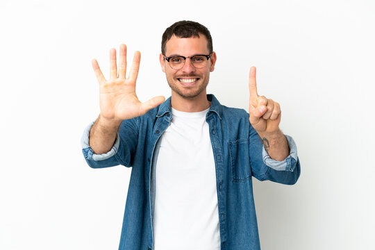 Brazilian man over isolated white background counting six with fingers