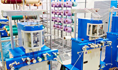 Bobbins of thread for cord knitting machine