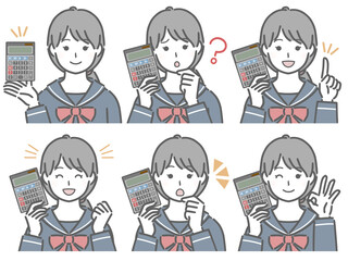 電卓を手に持つ女子学生