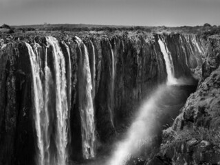 Victoria Falls and Gorge with Rainbow, Zambezi River, between Zimbabwe and Zambia, Africa in...